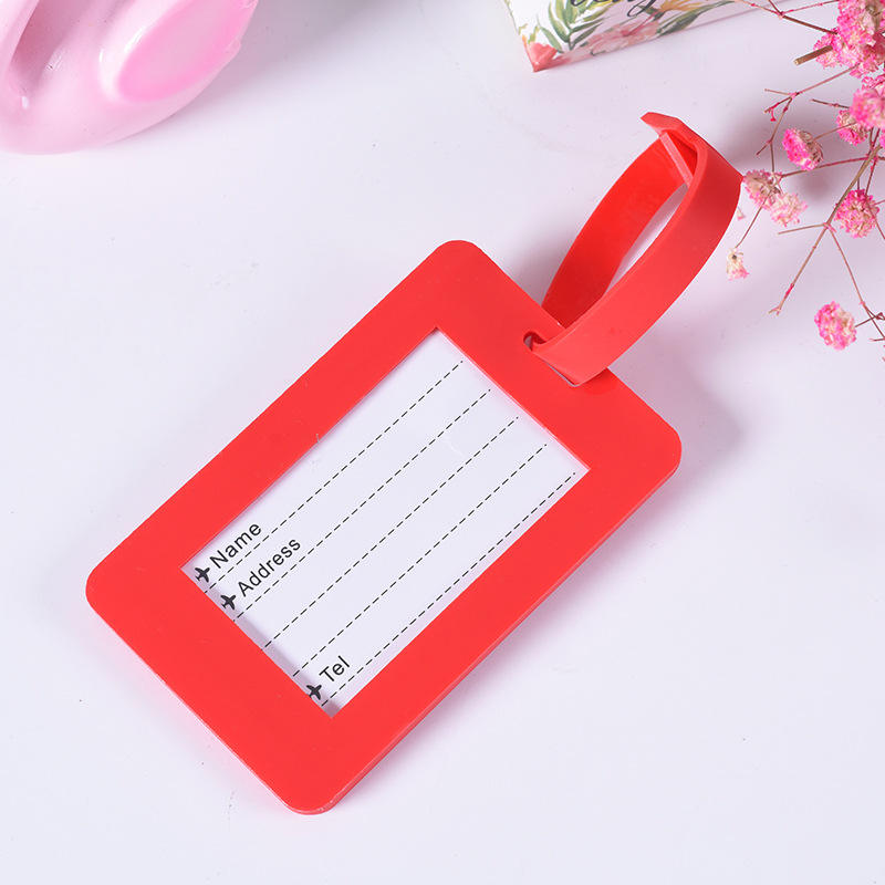 Reverso y texto de porta etiquetas para maleta y equipaje.